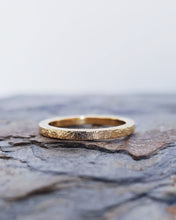 Load image into Gallery viewer, Custom wedding ring that has a rustic finish and has been handmade in 18ct gold in Cornwall, England.