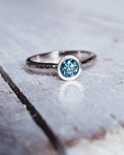 Load image into Gallery viewer, Close up of an ATLANTIC engagement ring featuring a 0.50ct blue diamond, that captures the essence of the ocean.