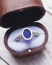 Load image into Gallery viewer, Close-up of a bespoke EMPRESS engagement ring showing handcarved oval sea glass with twelve ocean diamonds set in the 18ct white gold band.