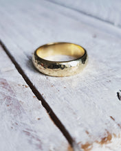 Load image into Gallery viewer, A close up of a gold wedding band for men which is 6mm wide and 2mm thick so designed to last a lifetime.