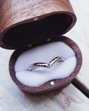 Load image into Gallery viewer, An 18ct white gold wedding ring that has a textured finish and tealquoise sea glass set within the point of the wishbone.