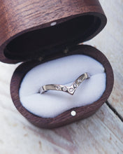 Load image into Gallery viewer, Wishbone wedding ring that is custom made. It has a smooth finish and five flush set diamonds set within the wishbone.