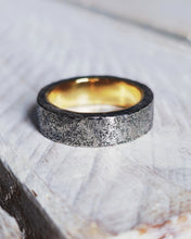 Load image into Gallery viewer, Two tone mens wedding ring with oxidised silver on the outside and lustrous highly polished 18ct yellow gold on the inside.
