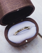 Load image into Gallery viewer, Organic flowing wedding ring that is made to order and bespoke. It has a smooth finish and eight flush set diamonds set around the whole band. Handcrafted in Newquay, Cornwall.
