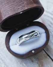 Load image into Gallery viewer, Handcrafted in Cornwall, this wedding band for men has a freeform and flowing look with sea glass set on the inside of the band.
