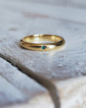 Load image into Gallery viewer, An 18ct yellow gold straight wedding and with tealquoise sea glass that has been flush set in the D shape band which has a smooth texture.
