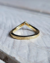 Load image into Gallery viewer, An 18ct gold curved wedding ring that is handmade in Cornwall to seemlessly fit around an engagement ring.

