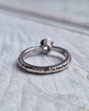 Load image into Gallery viewer, Back view of a rugged yet elegant looking hammered finish on an ATLANTIC diamond solitaire engagement ring which was handcrafted in 18ct white gold.
