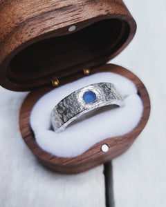 Unique bespoke sea glass ring that has round sea glass flush set in the 6mm band with a hammered finish.