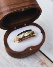 Load image into Gallery viewer, Handcrafted in Cornwall, this wedding ring has a textured finish on it and has been made in yellow gold.
