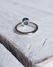 Load image into Gallery viewer, Back view of a MERMAID engagement ring showing the smooth finished, D shape band and gorgeous teal sea glass.
