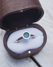Load image into Gallery viewer, Side view of an 18ct white gold, teal sea glass solitaire engagement ring that was lovingly handcrafted in Cornwall.
