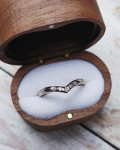 Load image into Gallery viewer, Wishbone wedding ring that is custom made. It has a hammered finish and five flush set diamonds set within the wishbone.
