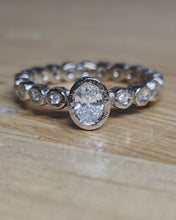 Load and play video in Gallery viewer, ETHEREAL Engagement Ring - Oval Certified Ocean Sourced Diamond + Full Diamond Band 0.45ct in 18ct White Gold - Size L - FIRST EDITION
