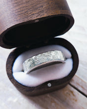 Load image into Gallery viewer, This side view shows the unique hand froged texture that has been created on this mens silver wedding band.
