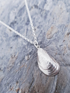 Sterling silver mussel shell necklace with incredible realistic detail.